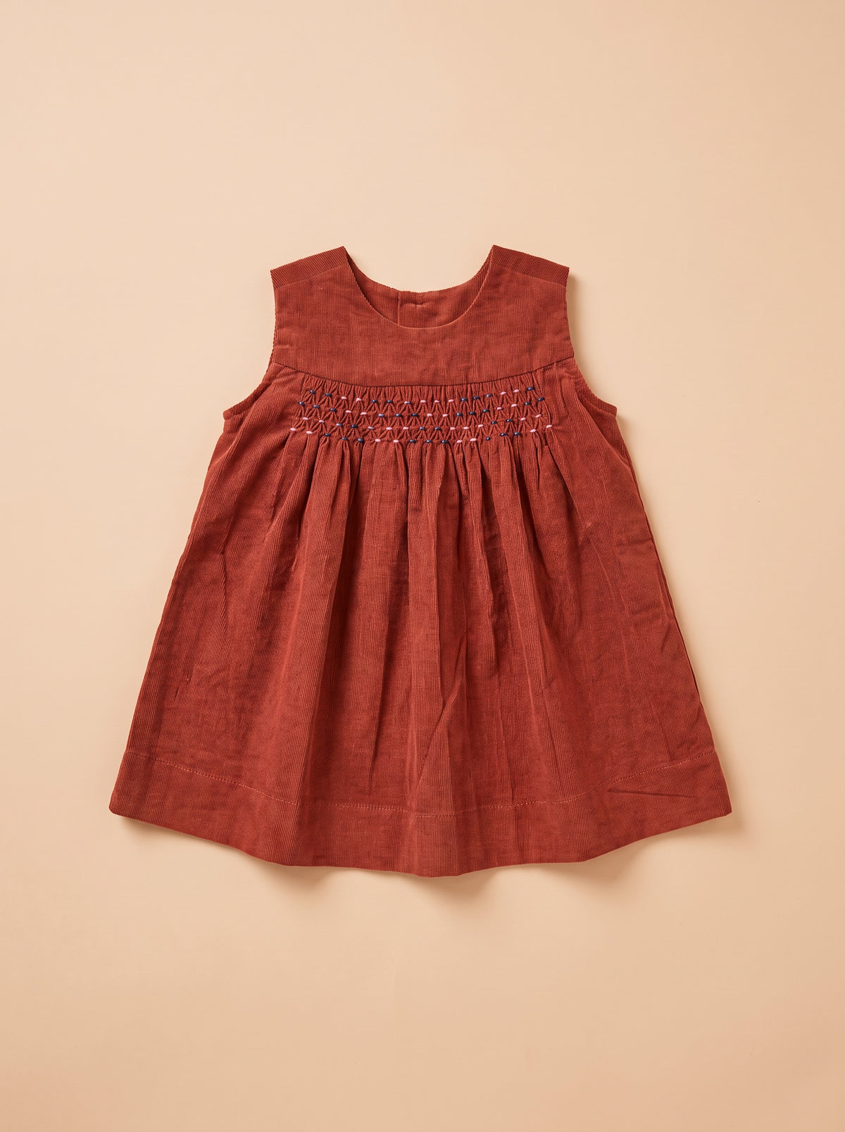 Robe Lalie Épices à plat - velours brique, smocks main, vue de face